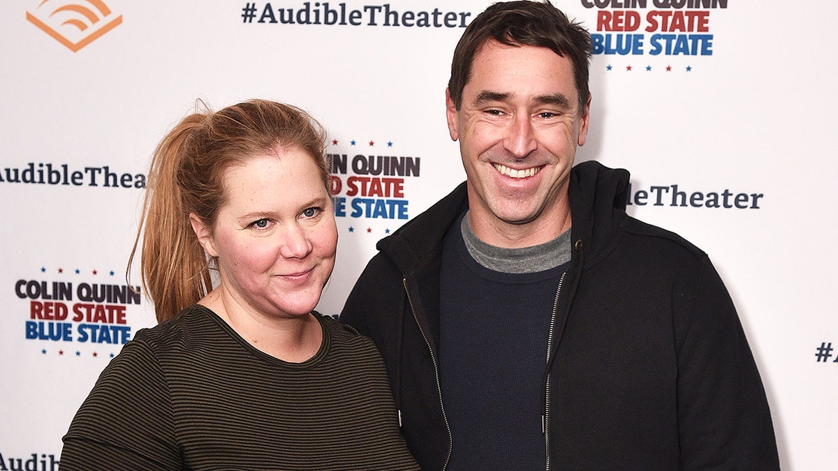 NEW YORK, NY - JANUARY 22: Amy Schumer and Chris Fischer attend the Opening Night for Colin Quinn's 