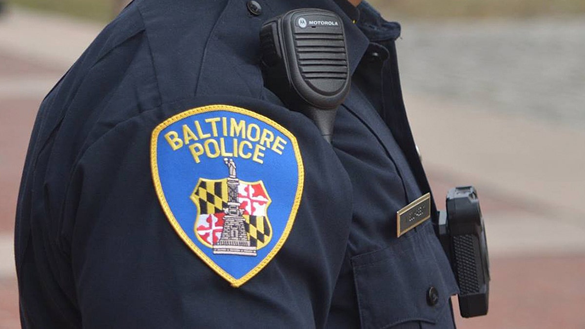 A Baltimore Police patch on an officer's uniform 