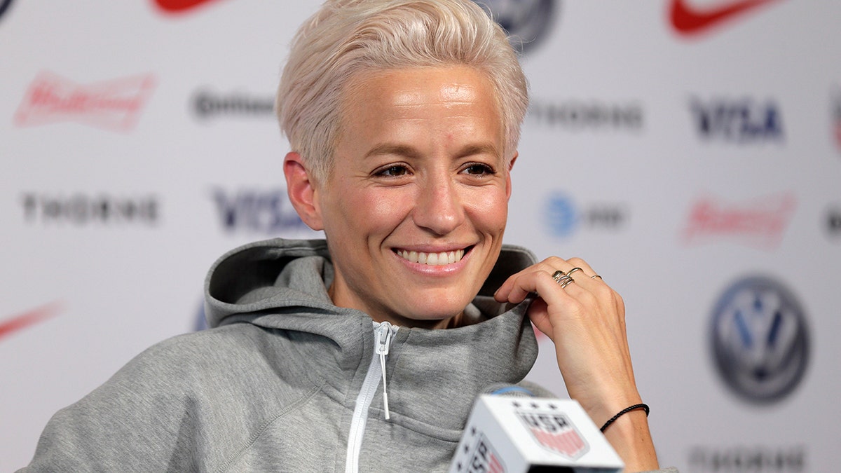 Megan Rapinoe, a member of the United States women's national soccer team, speaks to reporters during a news conference in New York, Friday, May 24, 2019. (AP Photo/Seth Wenig)