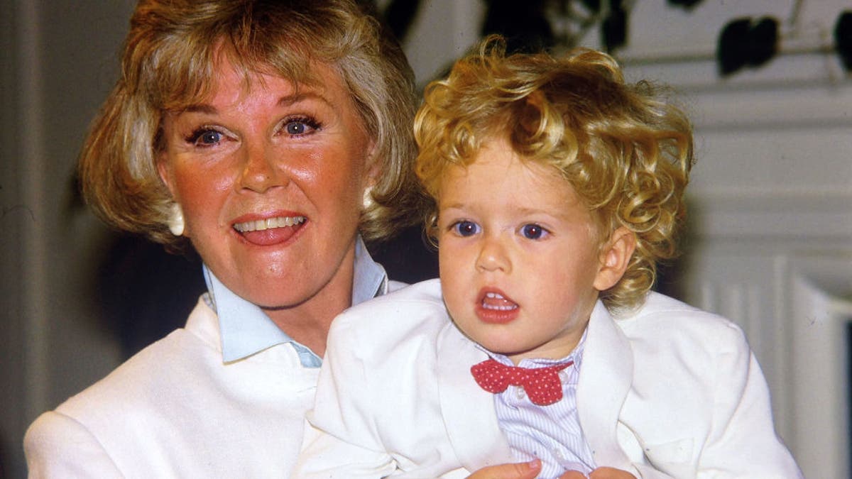 CARMEL CA, - JULY 16: Doris Day with her grandson Ryan Melcher 4, the son of her only child Terry Melcher at a press conference at the hotel she owns in Carmel, California July 16, 1985 ( Photo by Paul Harris/Getty Images )