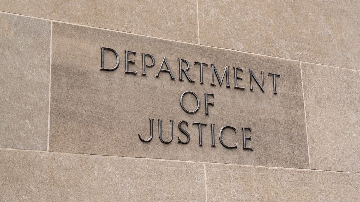 Washington, DC - July 12, 2017: United States Department of Justice sign in Washington, DC on July 12, 2017