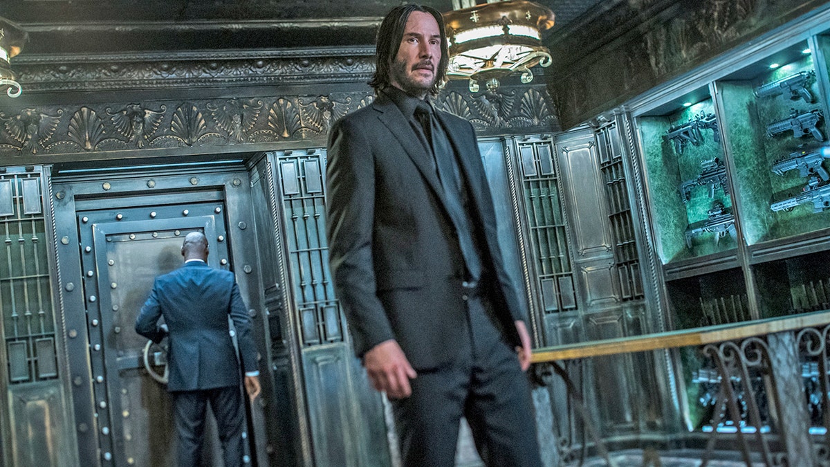 This image released by Lionsgate shows Keanu Reeves in a scene from