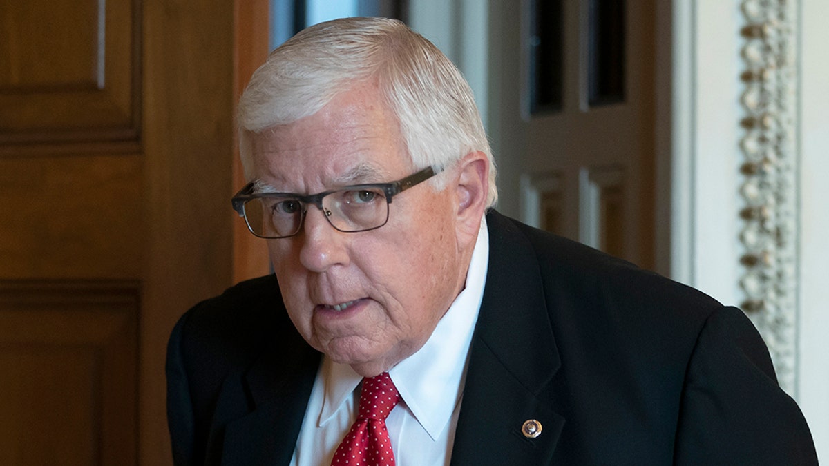 Sen. Mike Enzi, R-Wyo., chairman of the Senate Budget Committee, emerges from a meeting with fellow Republicans, at the Capitol in Washington, Tuesday, April 30, 2019. (AP Photo/J. Scott Applewhite)