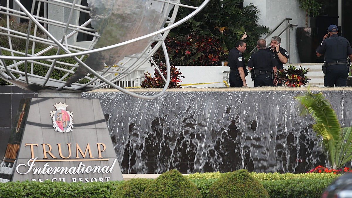 SUNNY ISLES, FLORIDA - MAY 12: Sunny Isles Beach police officers work near the entrance to the Trump International Beach Resort as they investigate a shooting that reports say involved rapper NBA Youngboy on the street in front of the resort on May 12, 2019 in Sunny Isles, Florida. Police continue to investigate the scene. (Photo by Joe Raedle/Getty Images)