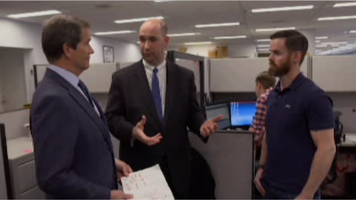 Jon Scott talks with Assistant Director in Charge William Sweeney and FBI Special Agent Brian Gander.