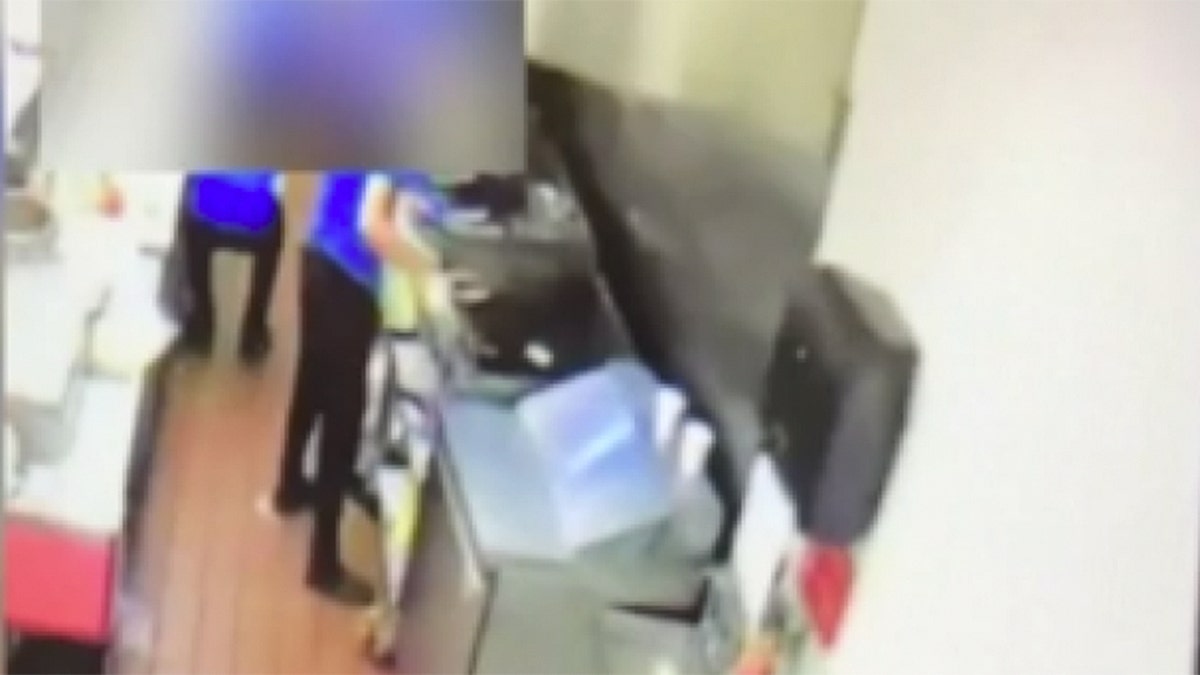 The three teenagers were caught on surveillance video spitting in the food before delivering it to the officers.