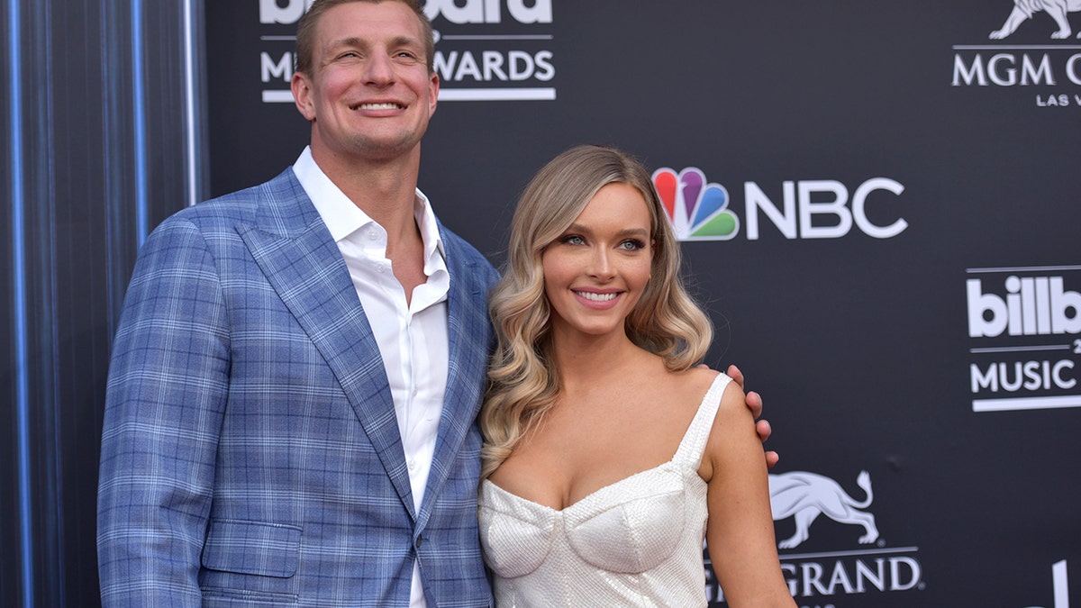 Rob Gronkowski, left, and Camille Kostek arrive at the Billboard Music Awards on Wednesday, May 1, 2019, at the MGM Grand Garden Arena in Las Vegas. (Photo by Richard Shotwell/Invision/AP)