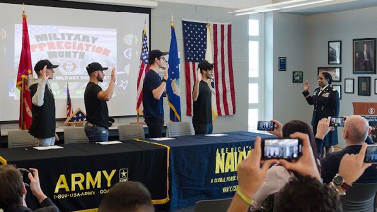 Four students at Becton Regional High School in New Jersey signed their intent to join the armed forces at the school's first "military signing day."