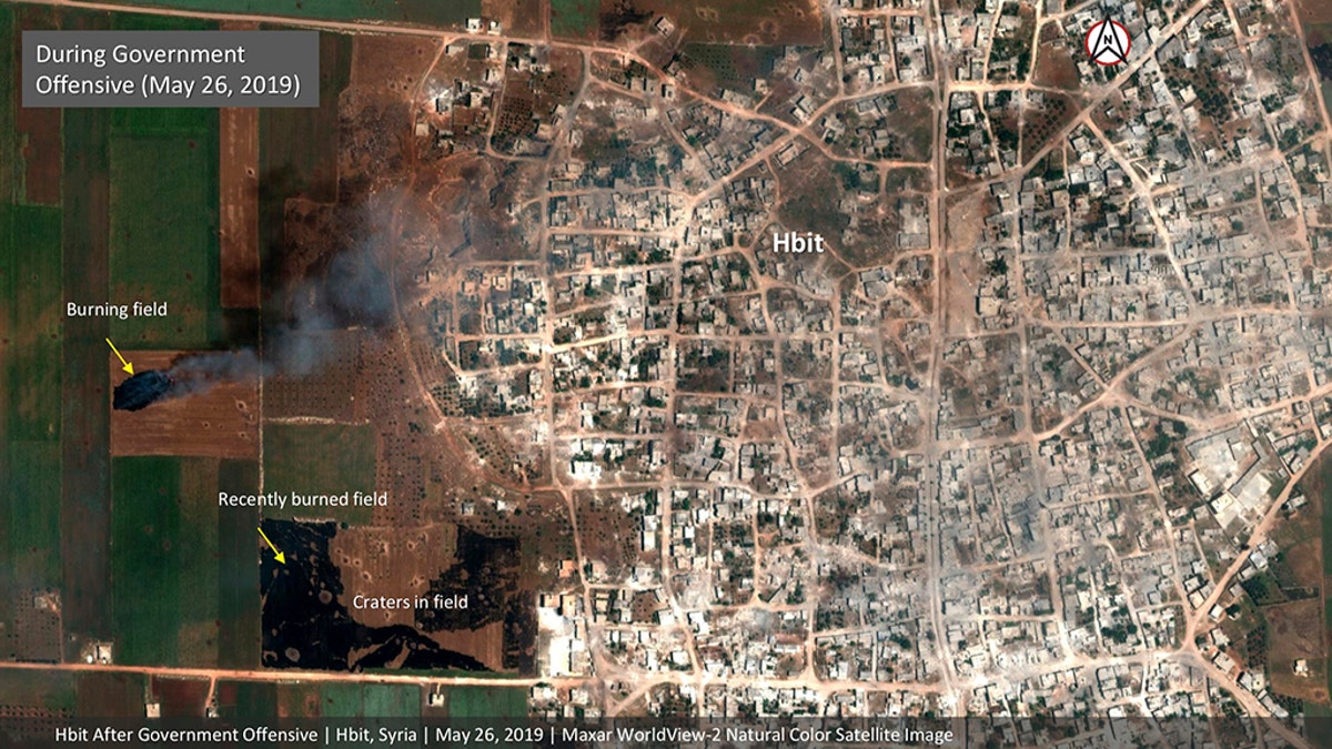 This satellite image provided by Maxar Technologies on Tuesday, May 28, 2019 shows significant damage to Habeet, Syria on May 26 as a result of a government offensive against the last rebel stronghold in the country. The images, provided to the Associated Press by the Colorado-based Maxar Technologies show fire still raging in olive groves and orchards during harvest season around Kfar Nabudah and Habeet, two villages on the edge of Idlib province where fighting has focused.