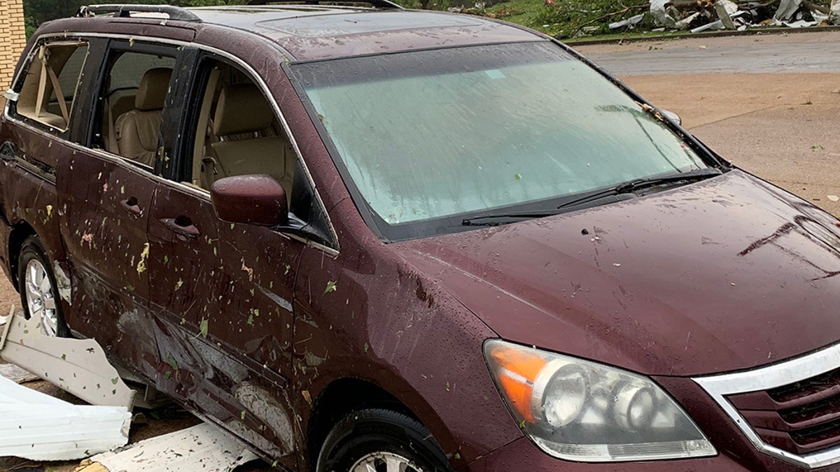 Damage to a vehicle after a tornado ripped through Jefferson City, Mo. late Wednesday.