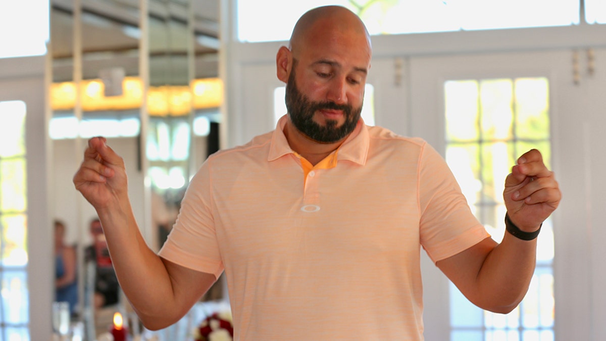 Saunderson, pictured above, "basically came in and was just at the bar trying to get drinks then he was dancing with the bridesmaids and the groom's mother."