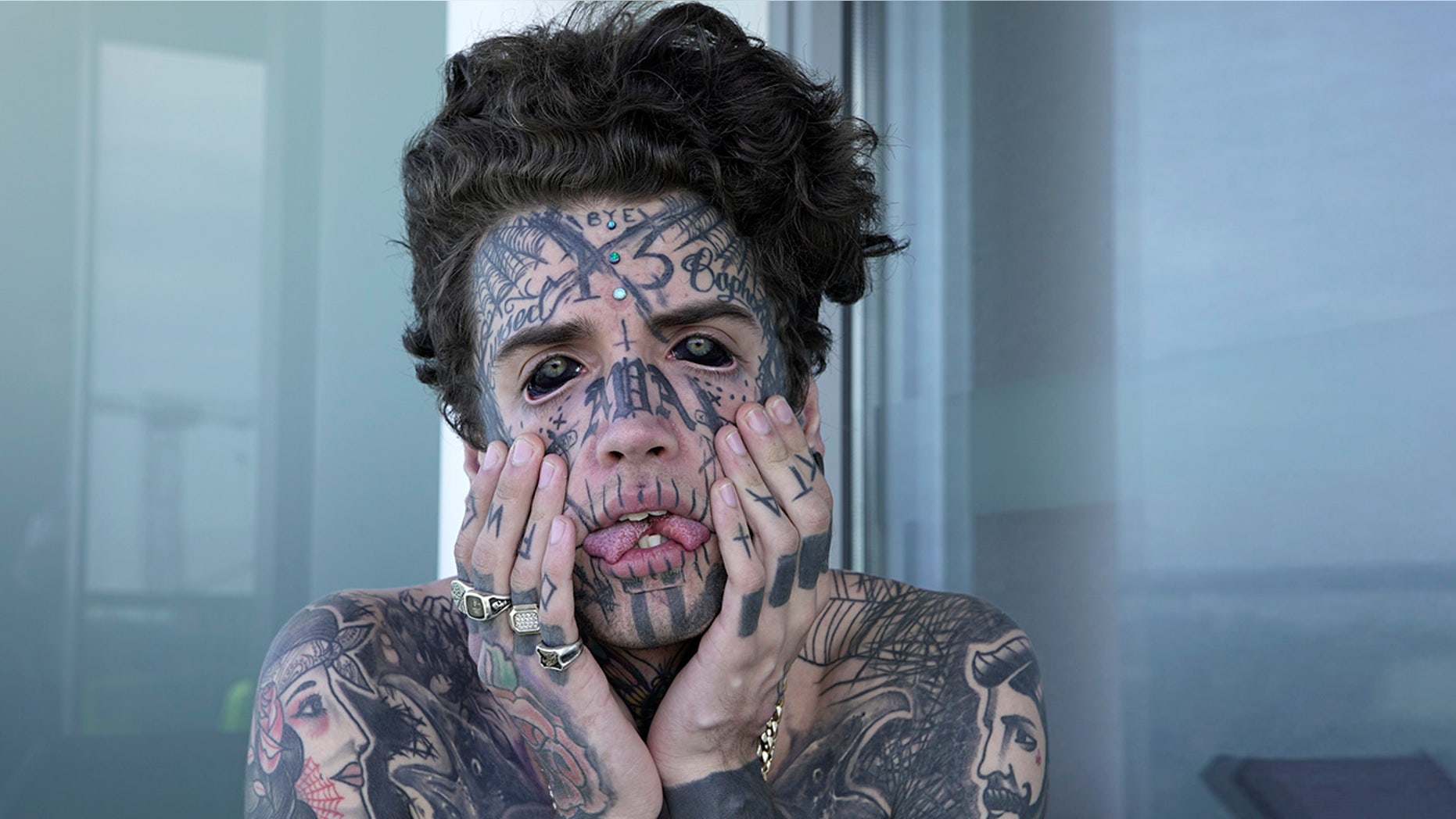Ethan Bramble, from Melbourne, Australia has had a string of body modifications including getting his tongue split, the removal of his belly button and even tattooing his eyeballs black. (Alana Tompson / Barcroft Images / Barcroft Media via Getty Images) Ethan Bramble, from Melbourne, Australia has had a string of body modifications including getting his tongue split, the removal of his belly button and even tattooing his eyeballs black. (Alana Tompson / Barcroft Images / Barcroft Media via Getty Images)
