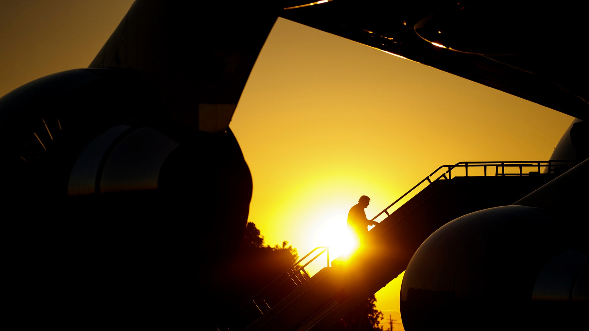 President Trump boards Air Force One at Lewis Armstrong New Orleans International Airport after attending a fundraiser, in Kenner, La., May 14, 2019.