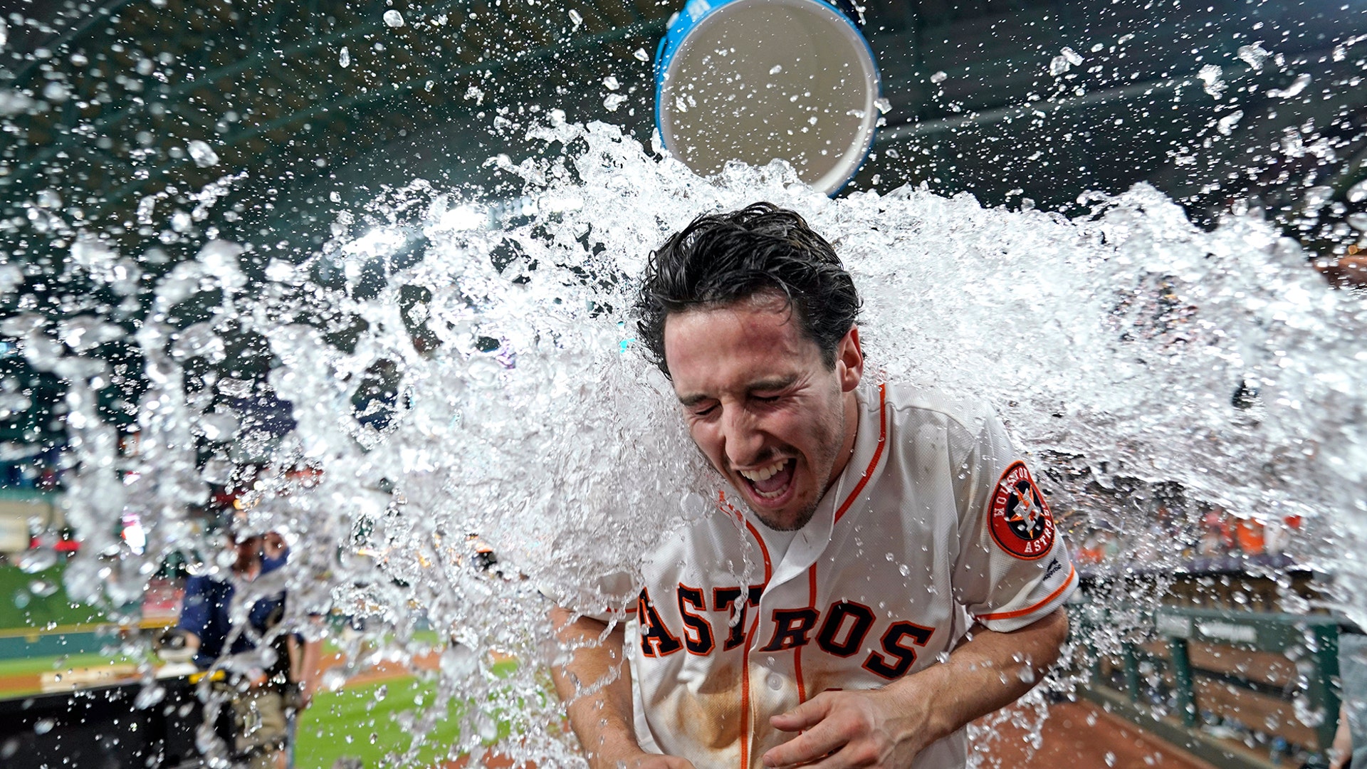 Houston Astros catcher Garrett Stubbs is doused with water after a baseball game against the Chicago Cubs in Houston, May 28, 2019.