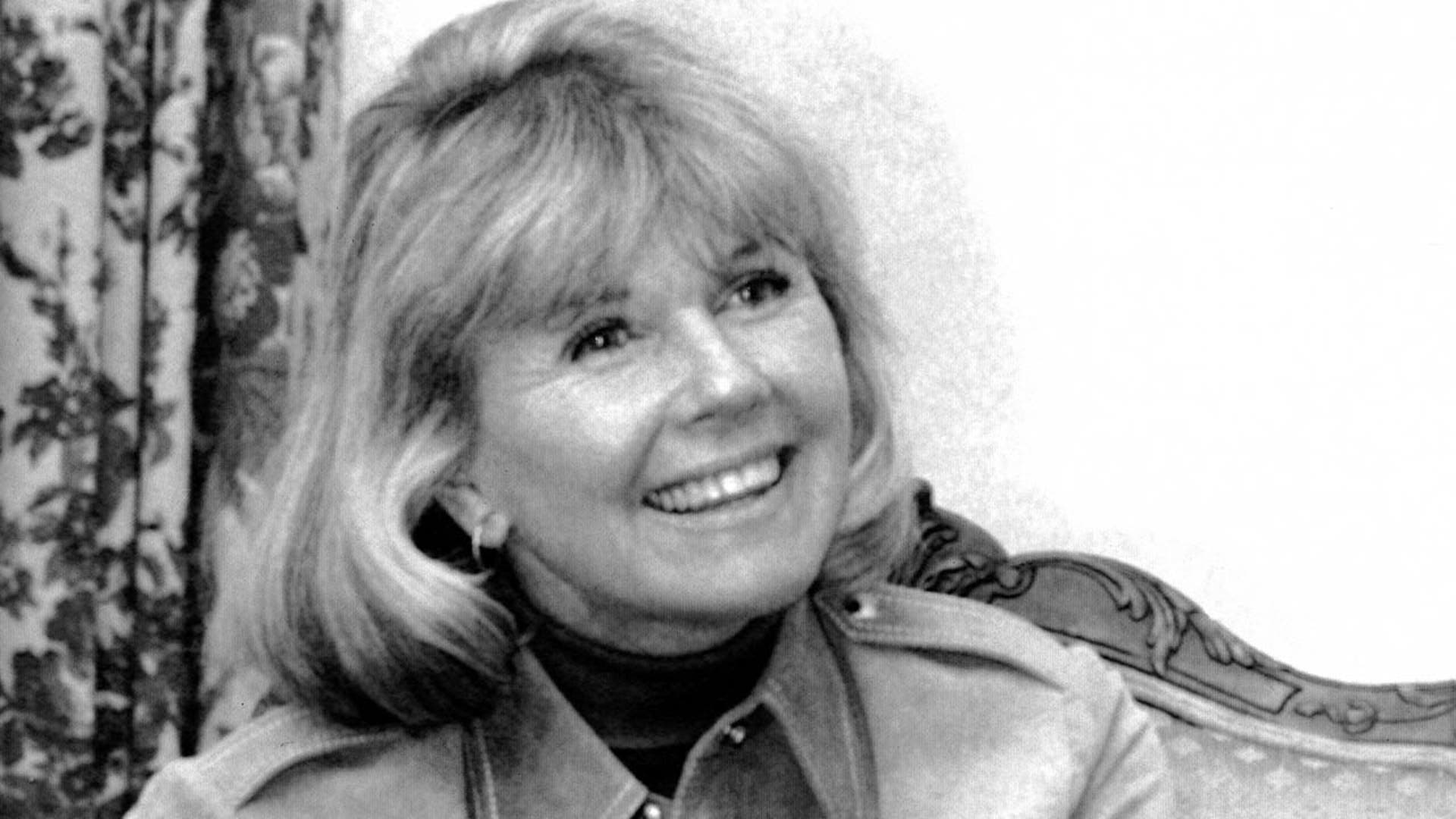 Doris Day answers questions in New York, during an interview on the book 