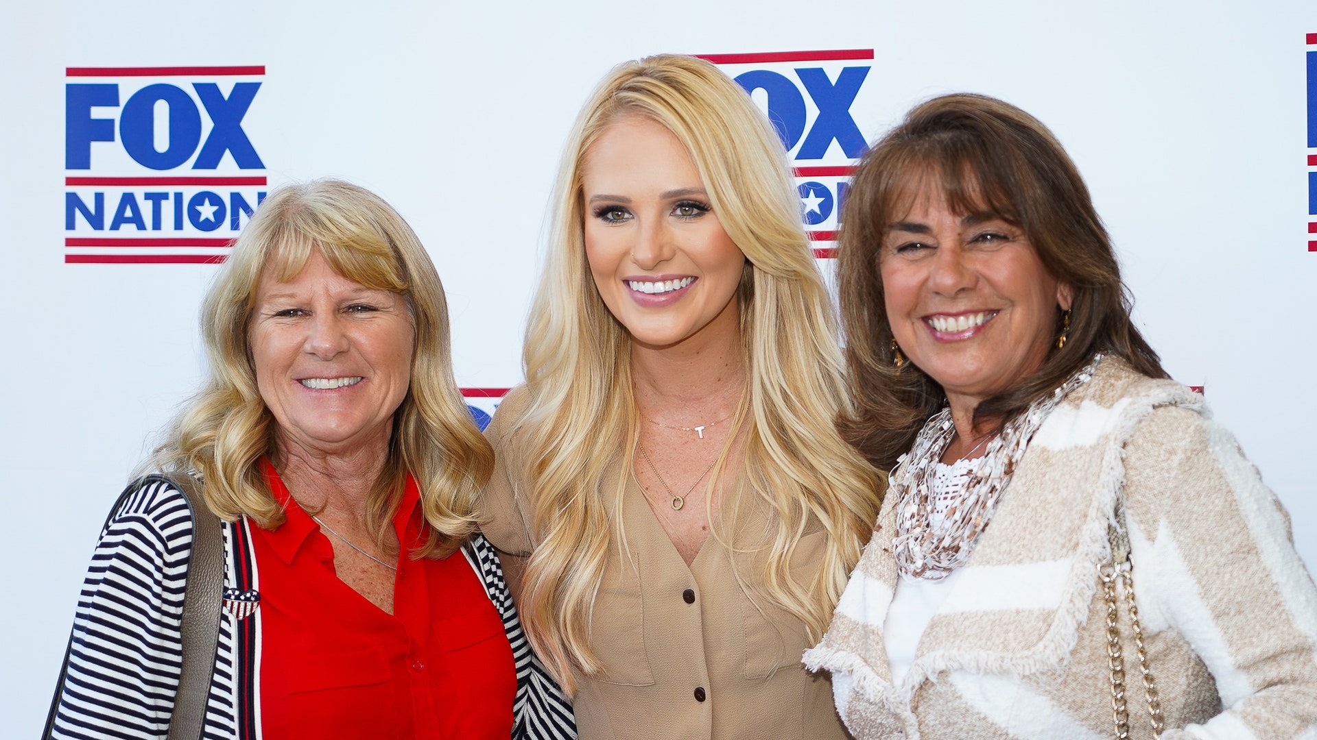 Fox Nation personality Tomi Lahren poses with fans at Fox Nation's inaugural fan summit.
