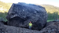 Colorado highway closed 'indefinitely' after massive boulders smash roadway