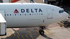 'Suicidal' passenger allegedly tried opening door on Republic Airways flight, screaming she needed to die