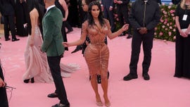 Kim Kardashian West says curve-hugging Met Gala gown wouldn't allow her to sit -- or use restroom