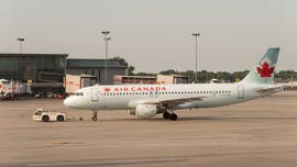 Air Canada plane struck by fuel truck at Toronto airport, injuring 5 people