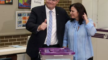 Australia's conservative coalition scores stunning political victory in general election, defies polls forecasting loss
