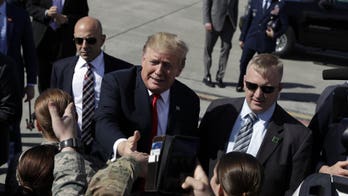 Trump cheers US troops during stop in Alaska on way to meet Japan's new emperor