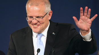 Australia's prime minister set to form majority government