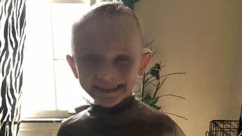 Thousands turn out for 5-year-old boy's funeral as parents sit in jail, accused of murder