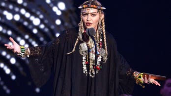 Madonna bares all in new mirror selfie while leaning on a crutch: 'Everyone has a crutch'