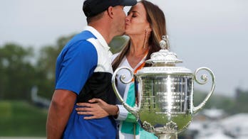 Brooks Koepka shuts down girlfriend’s kiss attempts during PGA Championship