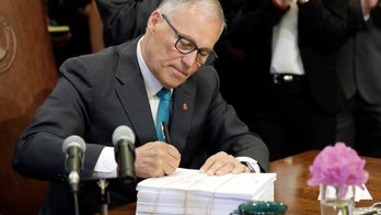 Washington Gov. Jay Inslee signs 'sanctuary' state law