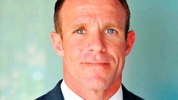 Navy SEAL accused of killing ISIS prisoner seeks to toss case over withheld evidence