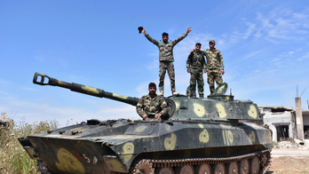 Syrian troops capture 2 villages in last rebel stronghold