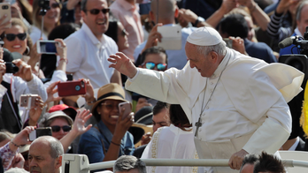 Pope urges China's Catholics to unify after bishop deal