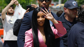 Rapper Cardi B indicted by grand jury on unspecified charges in strip club brawl