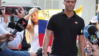 Spain, Venezuela trade barbs over refuge for activist