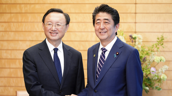 Japan, China agree to boost relations ahead of Xi visit