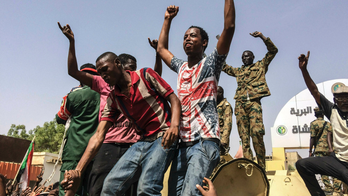 The Latest: Sudan charges al-Bashir with killing protesters