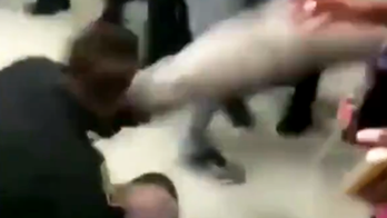 WATCH: Cop making arrest is kneed, kicked in face by student