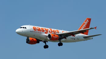 Easyjet passengers cheer as 'aggressive' couple is removed from flight