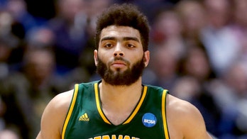 University of Vermont star withdraws from NBA draft to finish senior year
