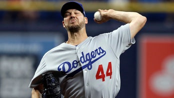 Los Angeles Dodgers' Rich Hill launches into profane tirade after bunt single during shift