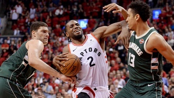 Leonard scores 36, Raptors beat Bucks 118-112 in 2 OTs