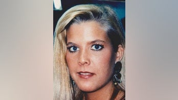 Twin sister's billboards drawing new attention to woman's unsolved 1996 murder