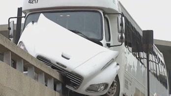 Shuttle bus at Newark airport strikes concrete barrier; at least 12 injured
