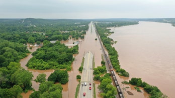 At least 1 dead in vehicle submerged in Arkansas floodwaters, police say