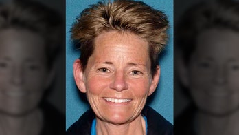 NJ woman charged in drowning of puppy found in weighted cage