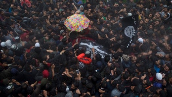 Thousands mourn Al Qaeda-linked terrorist - dubbed 'India's most wanted' militant - killed in Kashmir
