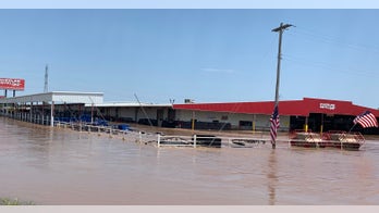 Oklahoma braces for the worst: more rain, eroding levees and looters