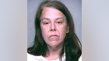 Arizona woman smothers mom, places bottle of gin on body, court documents say